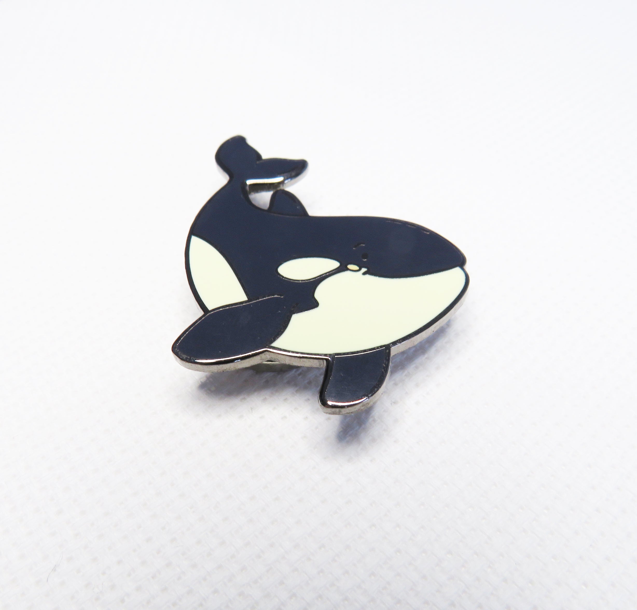 Orca whale needleminder on a background
