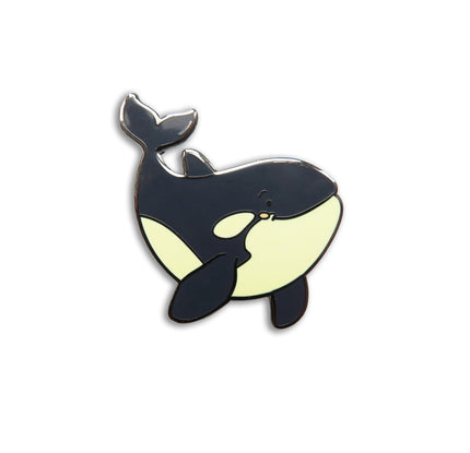 Orca whale-shaped pin on a background