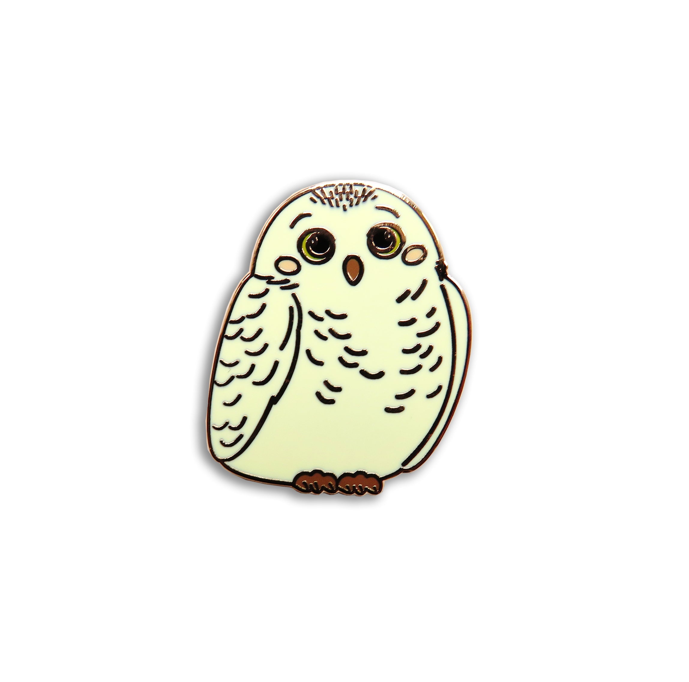 Owl-shaped pin on a white background