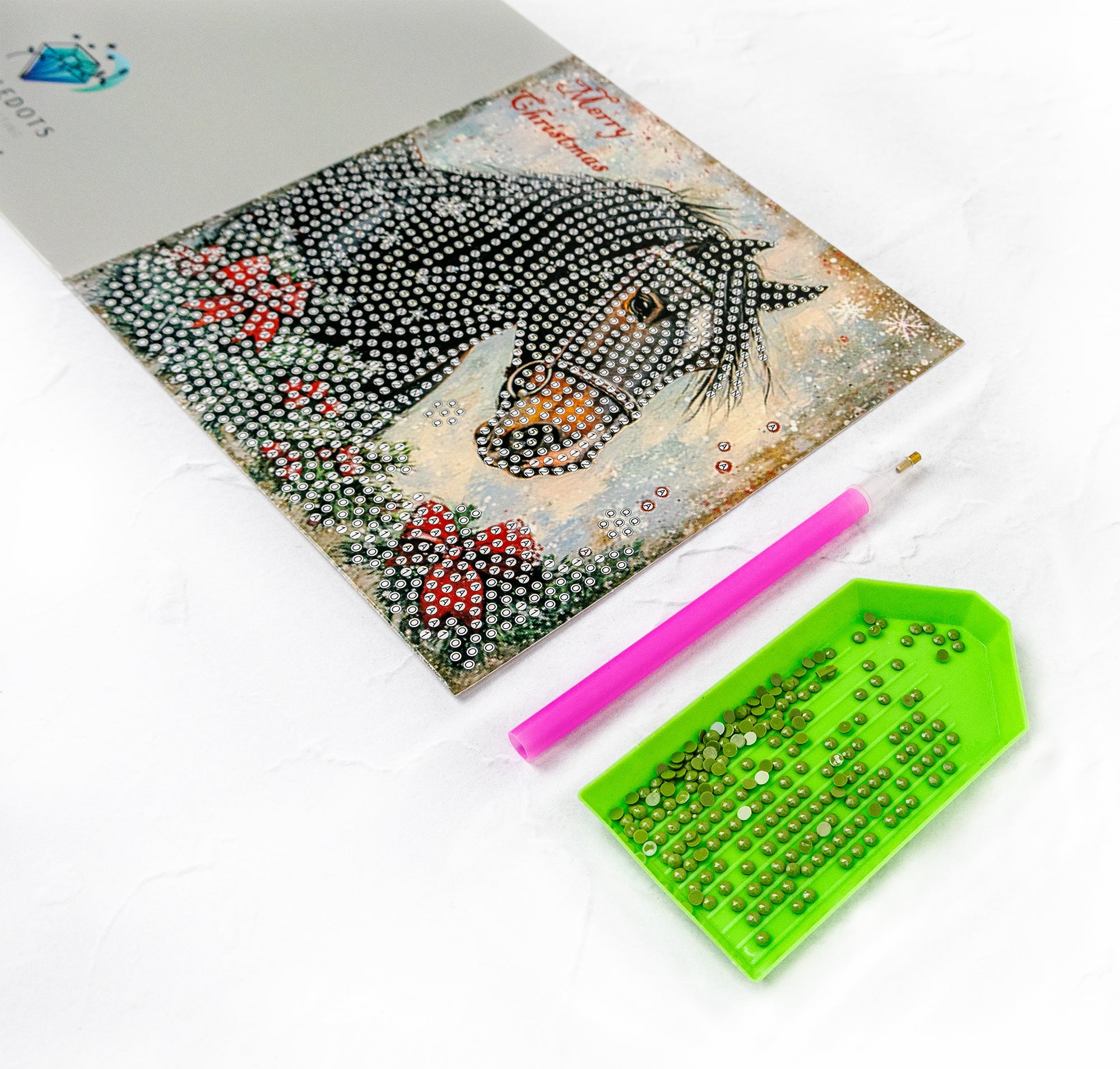 Artistic depiction of a fish with beads and tools on a white background