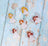 Decorative angel figurines on a textured blue surface