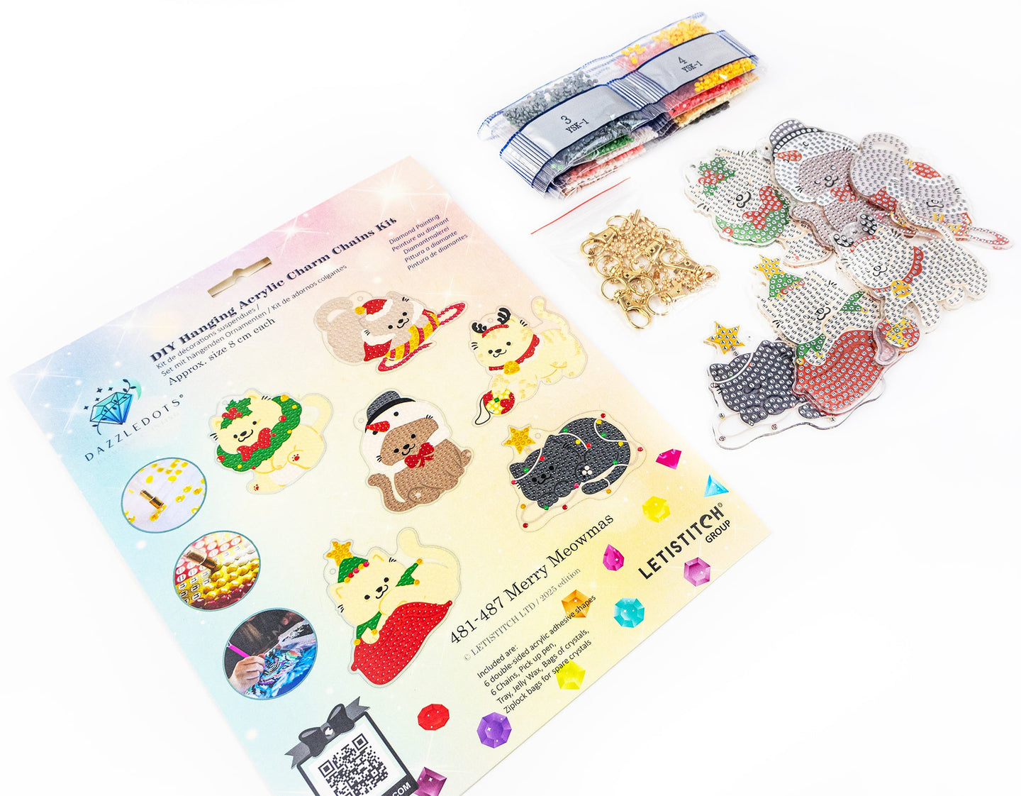 Set of Christmas-themed acrylic charms with packaging on a white background
