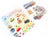 Set of Christmas-themed acrylic charms with packaging on a white background