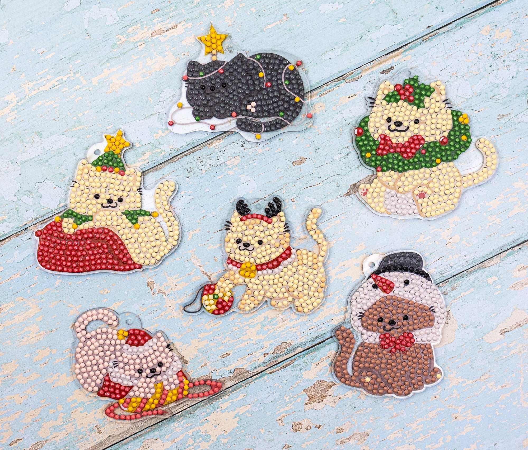 Set of decorative animal figurines on a wooden surface