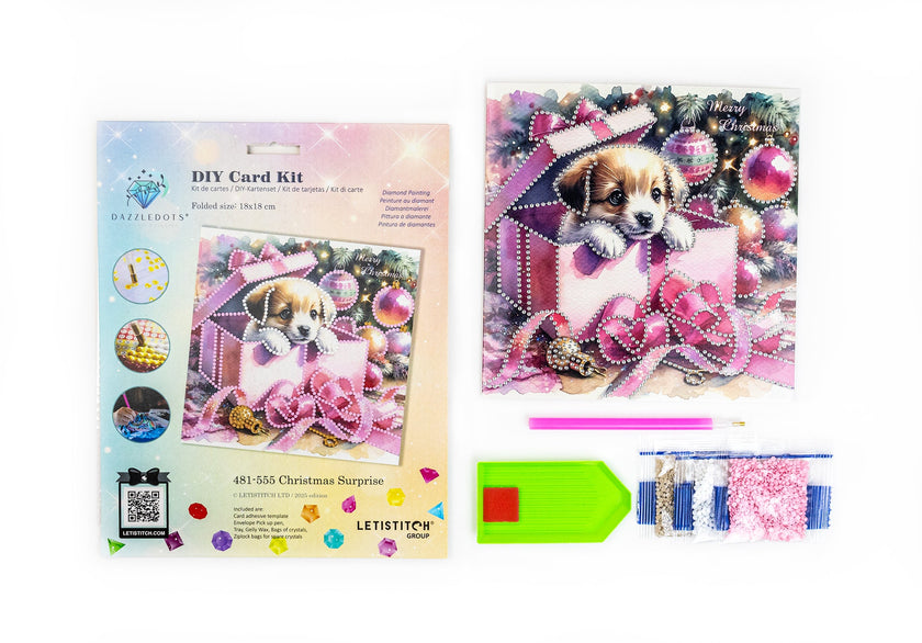 DIY card kit with a puppy design and accessories on a white background