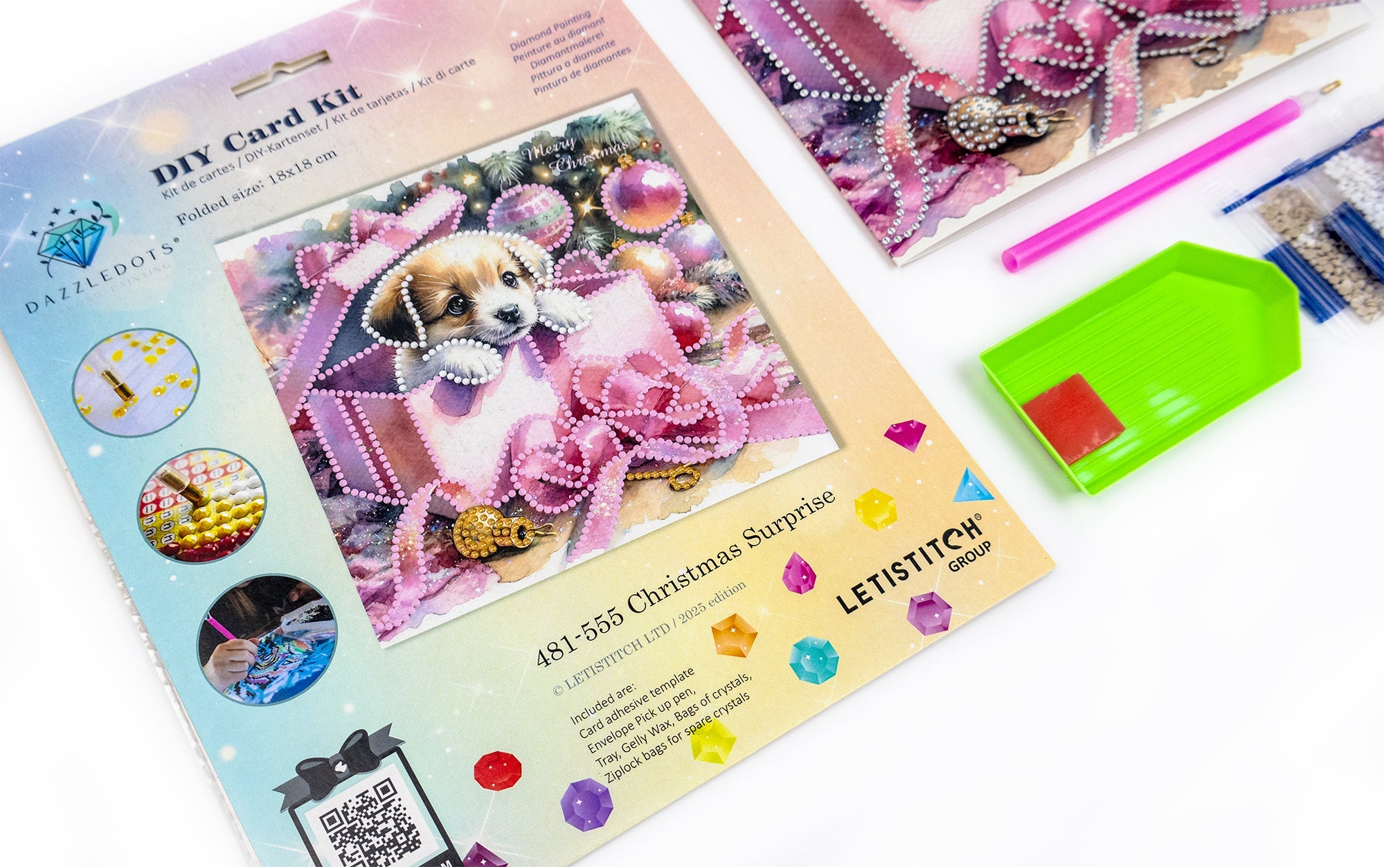 DIY card kit with a dog illustration and crafting supplies on a white background