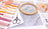 Embroidery hoop, threads, scissors, and a pattern sheet on a table.