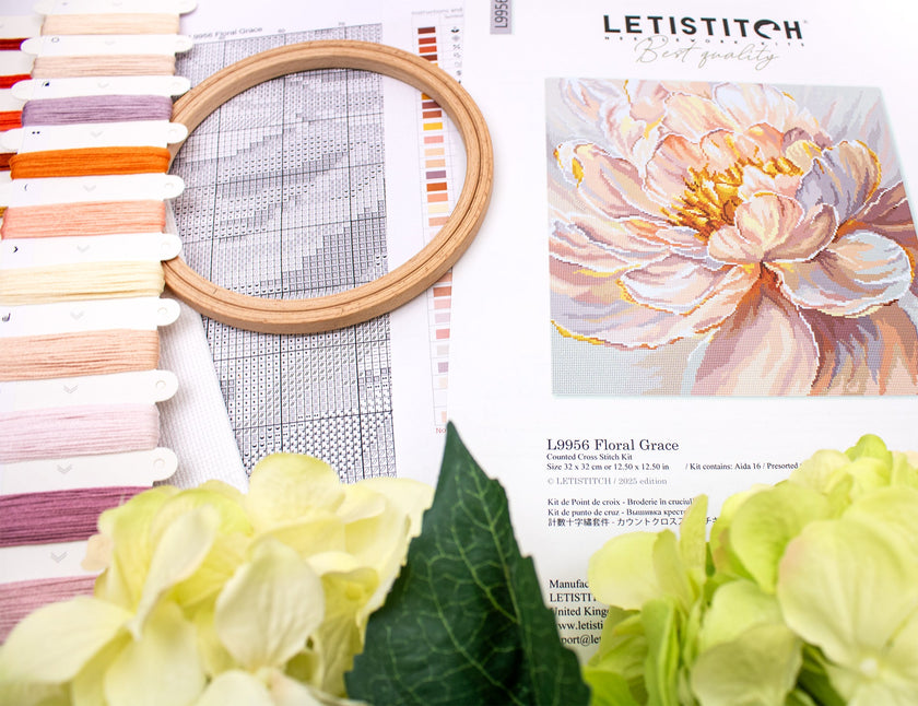 Embroidery hoop, threads, and floral fabric with LETISTITCH branding on a white background.