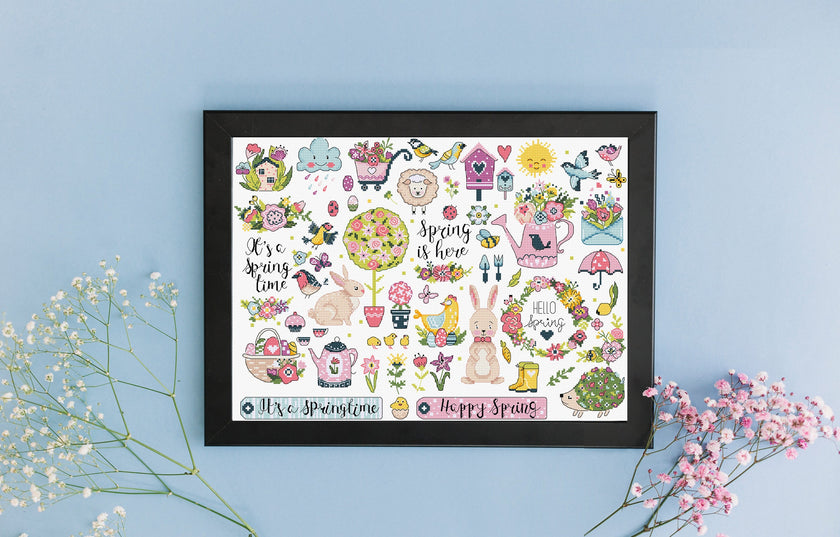 Framed spring-themed artwork with illustrations on a light blue background