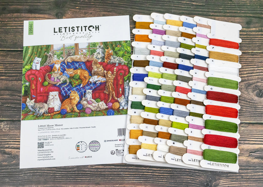 Letistitch embroidery thread set with color swatch on a wooden surface