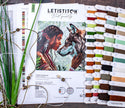 Embroidery kit with pattern sheet, threads, and color chart on a wooden surface.