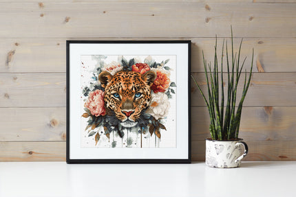 Framed artwork of a leopard with flowers on a wooden wall.