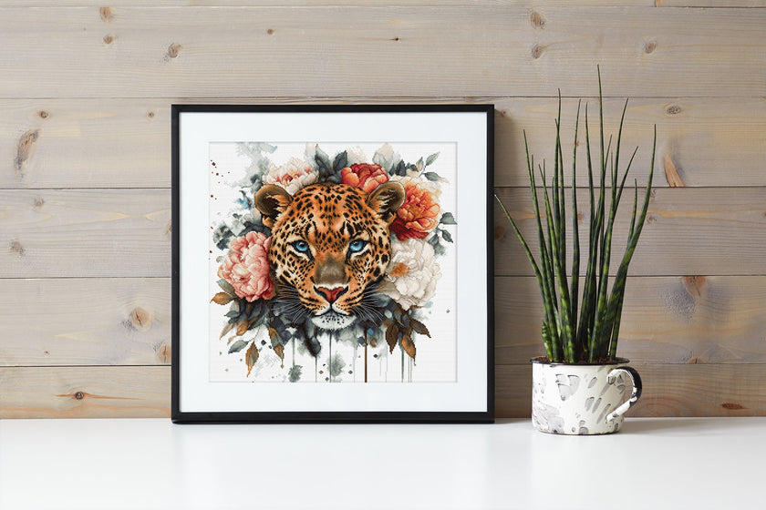 Framed artwork of a leopard with flowers on a wooden wall.