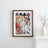 Framed artwork of a character holding a glass of wine surrounded by roses on a white wall.