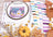 Embroidery hoop with a colorful design, surrounded by threads and autumn decorations on a wooden surface.