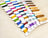 Color swatch card with various thread colors on a beige background