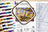 Embroidery kit with thread set, design book, and hoop on a white background