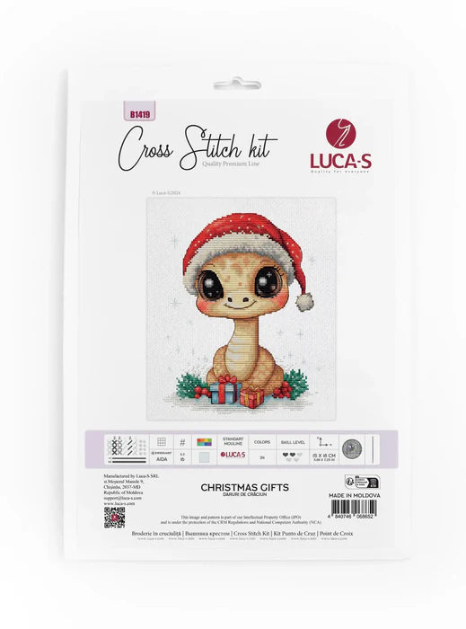 Cross stitch kit packaging featuring a cute dinosaur character with a Santa hat and Christmas gifts, brand 'Luca-S' visible.