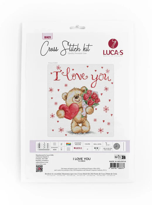 Cross stitch kit packaging with a teddy bear holding flowers and 'I love you' text, branded as Luca-S.