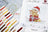 Cross stitch kit with a Christmas-themed design and color chart.