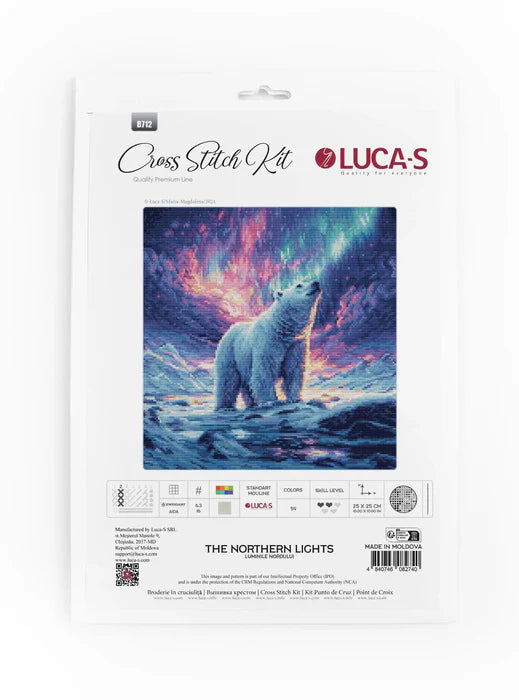 Cross stitch kit packaging featuring a polar bear and northern lights design, brand 'Luca's' visible.