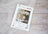 Lucas Gold Collection cross-stitch kit on a wooden surface