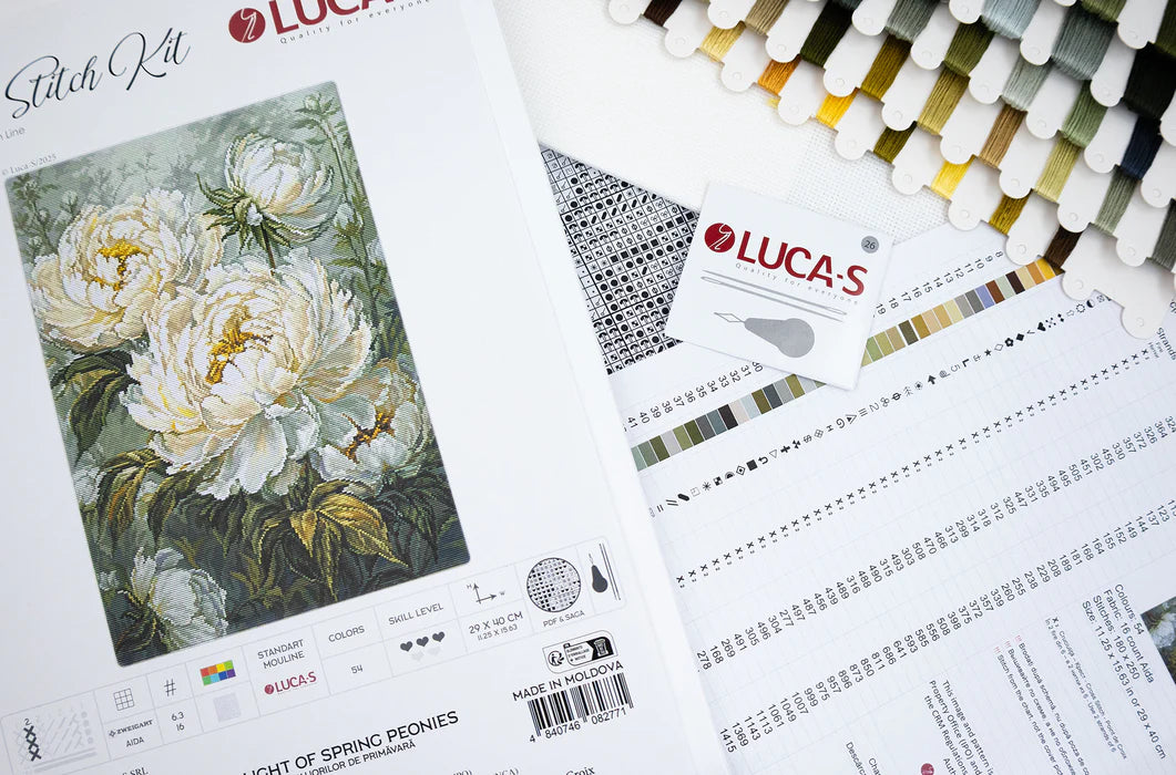 Stitch kit with floral design and color swatch on a white background