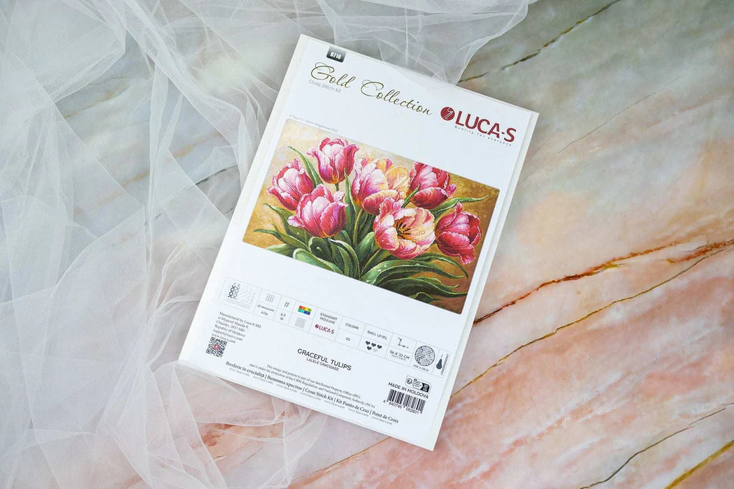 Lucas Gold Collection cross-stitch kit with tulip design on a marble surface