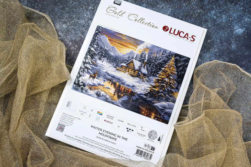 Lucas Gold Collection cross-stitch kit packaging with a winter scene design.