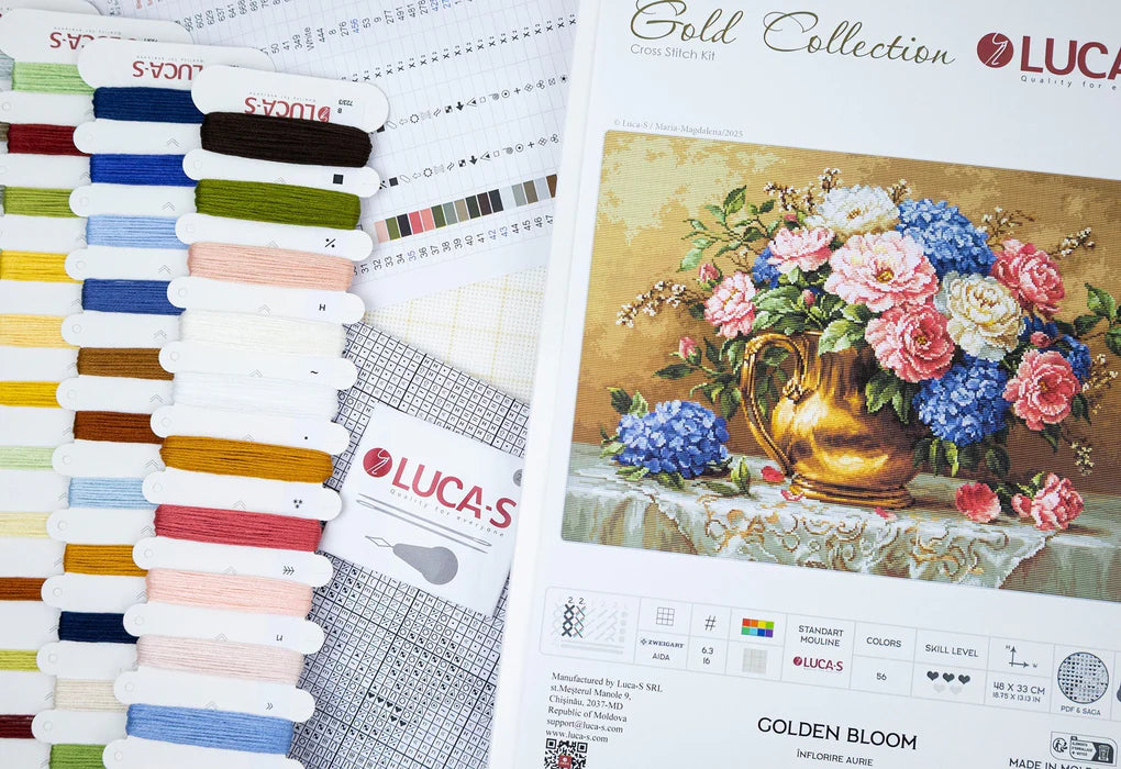 Color swatches and cross-stitch pattern with 'Luca-S' brand on a floral design.