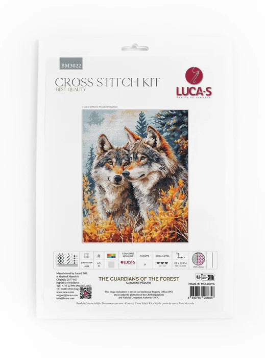 Cross stitch kit packaging with two wolves in a forest design on a white background
