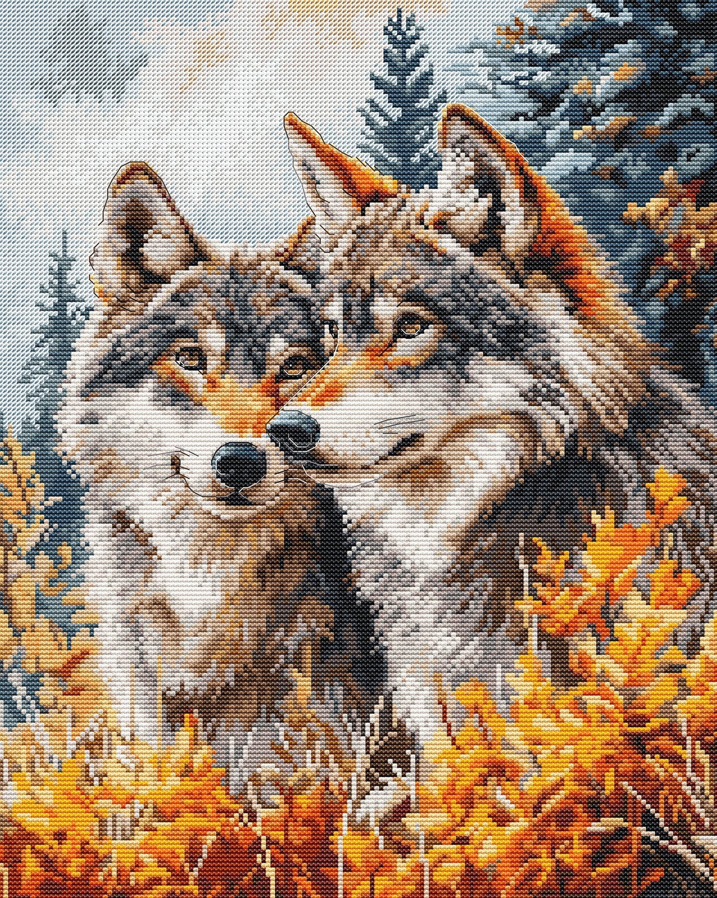 Cross-stitched design of a wolf in a forest with autumn foliage