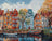 Painting of a canal scene with colorful houses and boats.