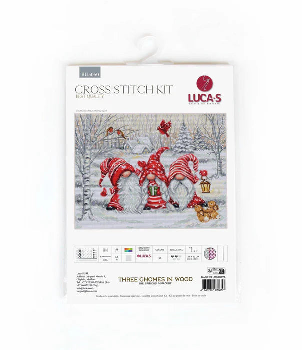 Cross stitch kit packaging with three gnomes in a winter scene, brand 'Lucas' visible.