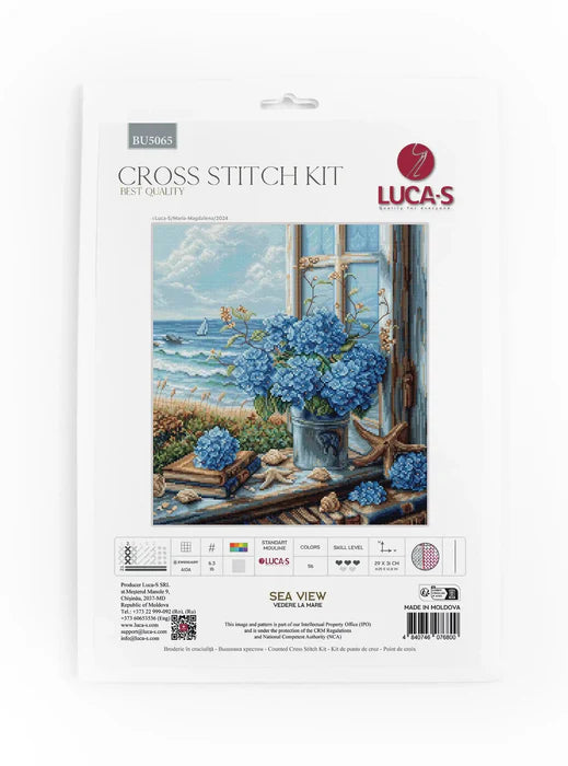 Lucas cross stitch kit packaging with a scenic design of flowers and a window.