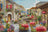 Stitched scene of a quaint European street with shops, tables, and chairs.
