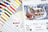 Lucas paint set with color swatches and a Christmas-themed painting of Santa Claus.