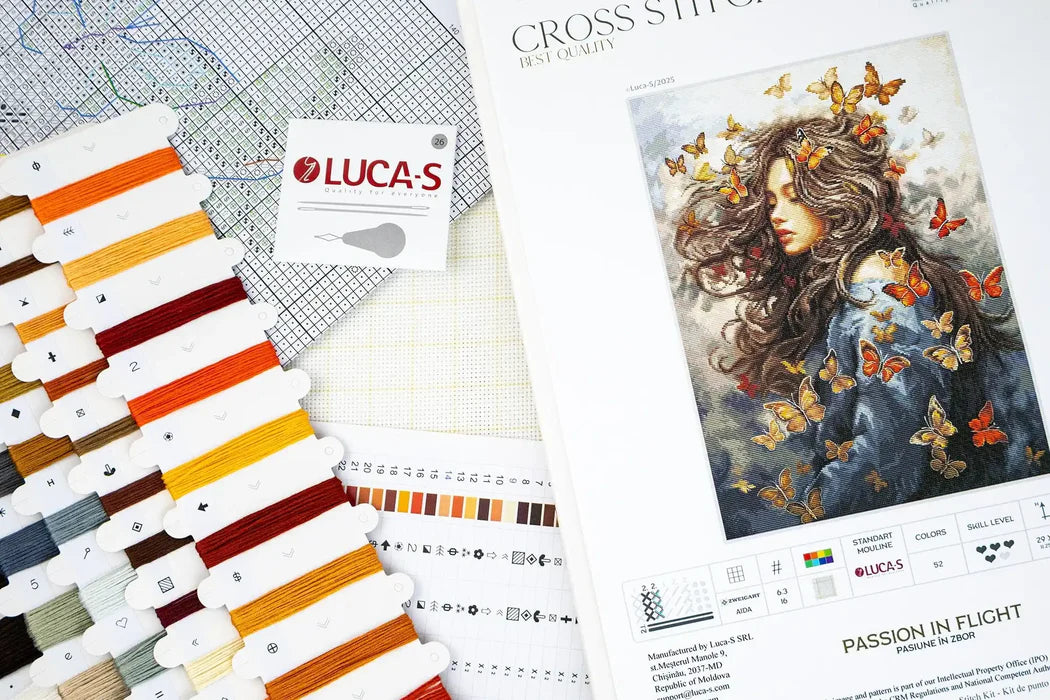 Lucas embroidery floss set with a cross-stitch pattern featuring a woman with butterflies.