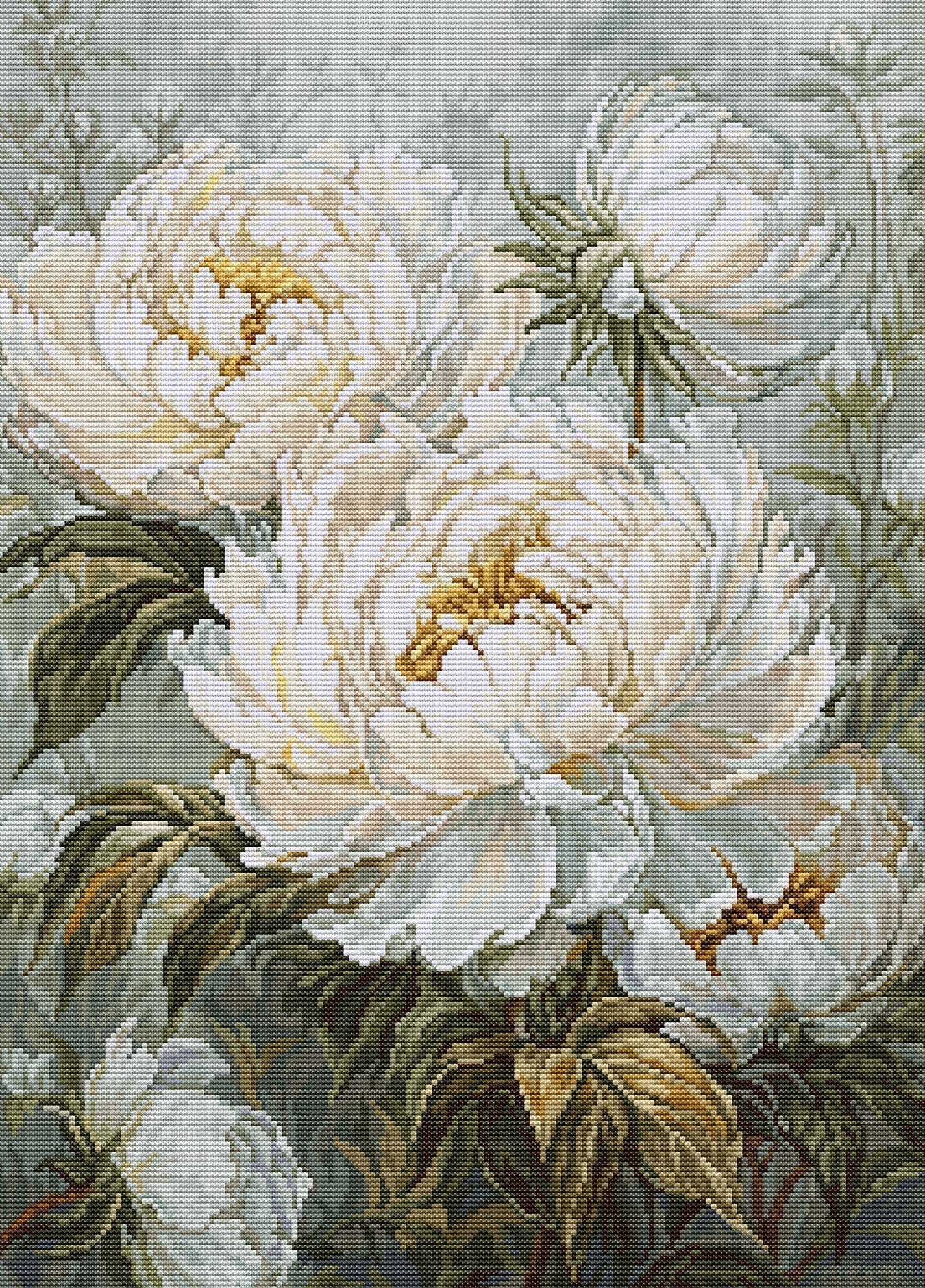 Close-up of a cross-stitched floral design with white flowers and green leaves on a textured fabric background.