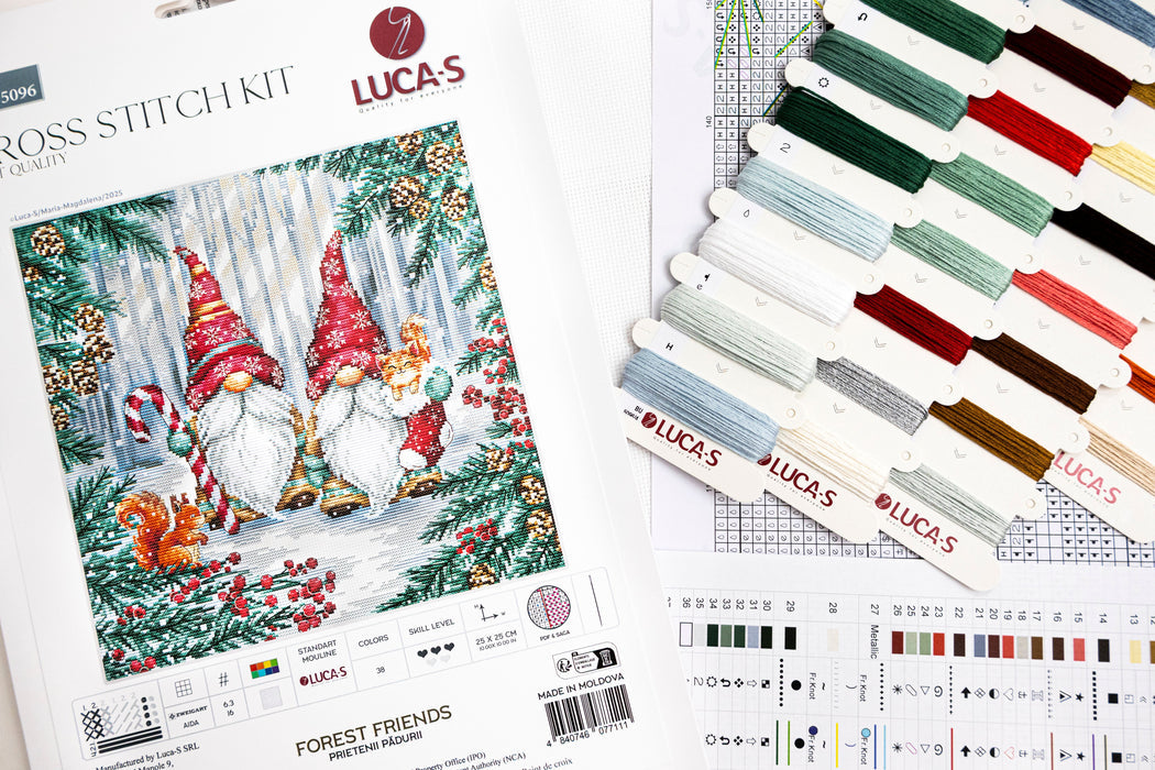 Lucas cross stitch kit with Christmas-themed gnomes and color swatches.