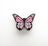 Pink butterfly-shaped needleminder on a white background