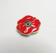 Red poppy flower needleminder on a white background