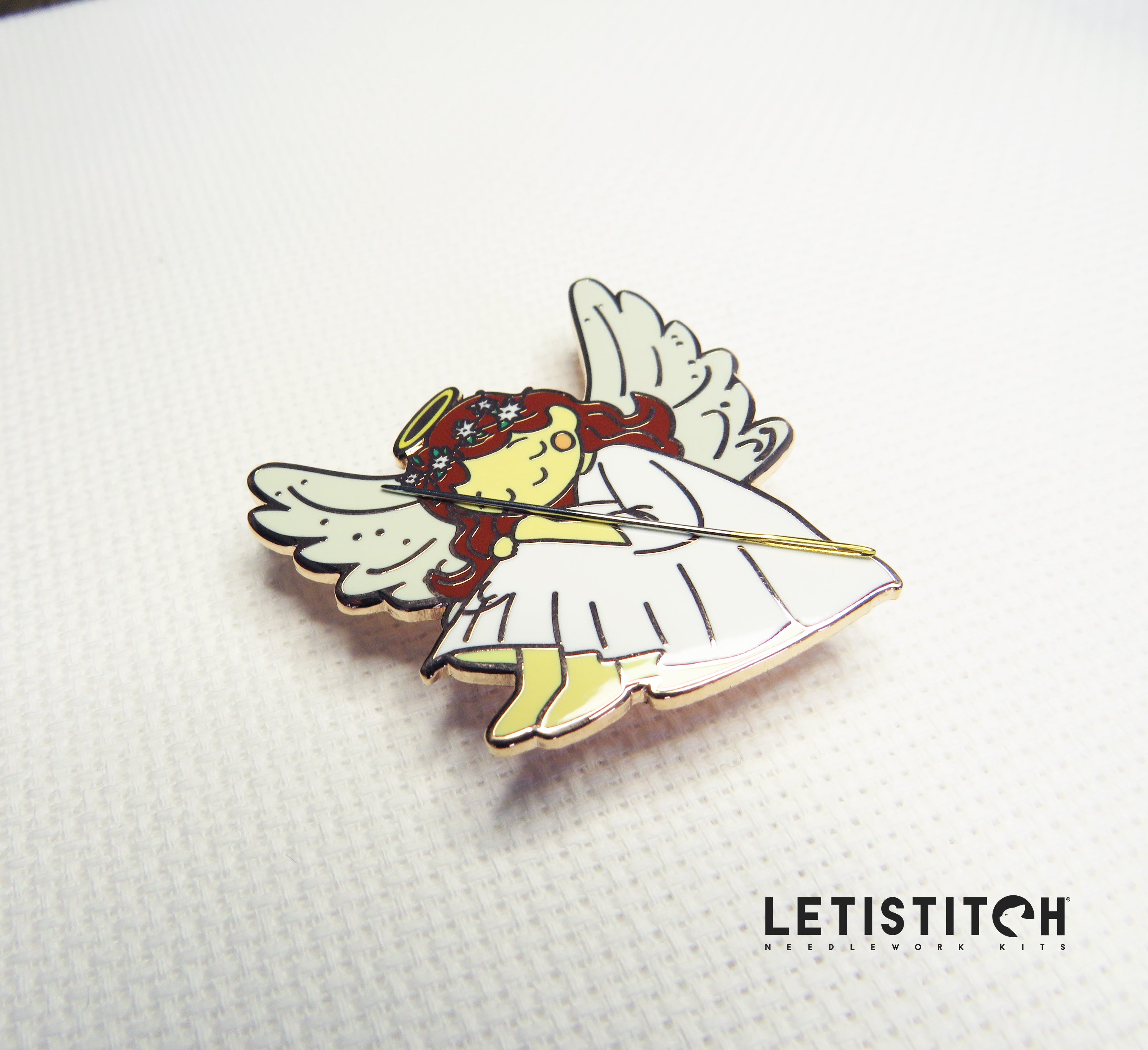 Angel-shaped needleminder on a white background with 'LETIStitch' branding.