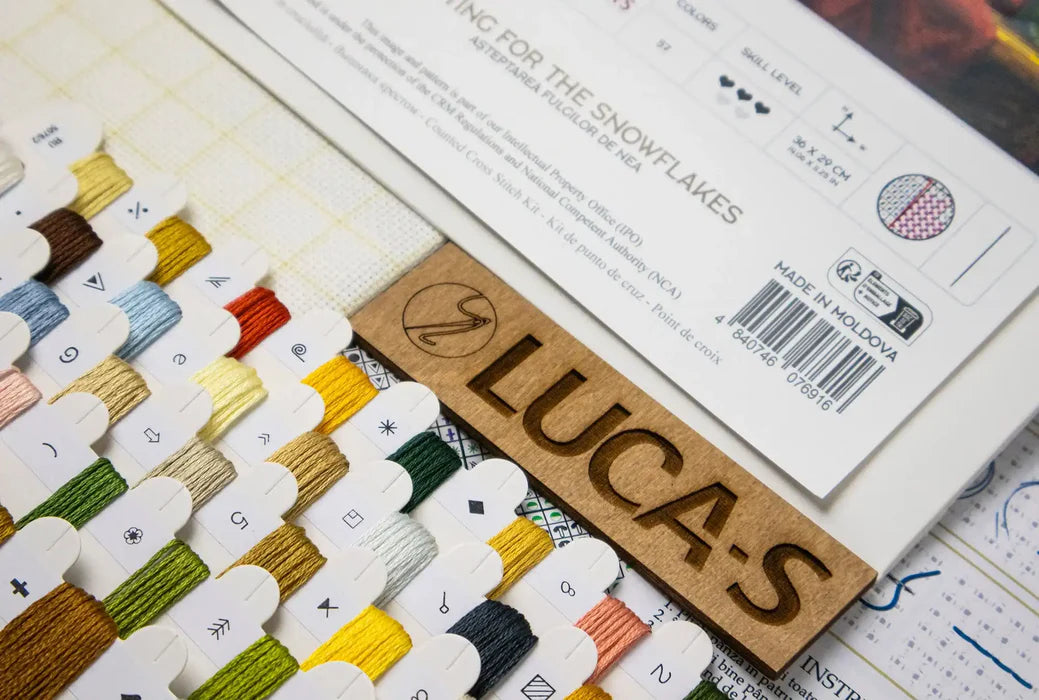 Color swatch book with 'Lucas' branding and a close-up of thread spools.