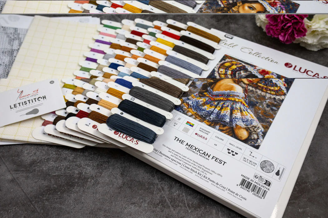 Color swatch book with fabric samples and a photo of a person wearing a colorful scarf.