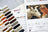 Color swatches and a design book with a deer and woman on the cover, featuring Luca-S brand.