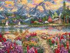 Cross-stitched landscape with mountains, lake, cabin, and deer.