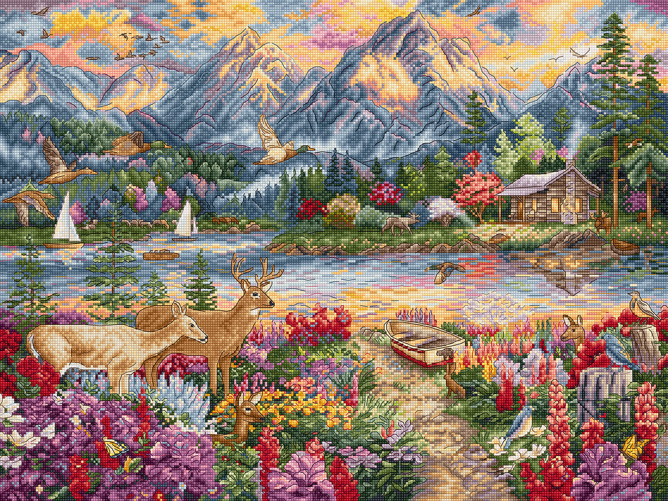 Cross-stitched landscape with mountains, lake, cabin, and deer.