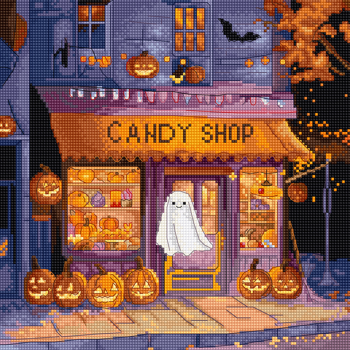 Halloween-themed candy shop with pumpkins and a ghost in front of a window.