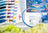 Embroidery hoop with floral design, thread colors, and Latch hook kit on a floral background